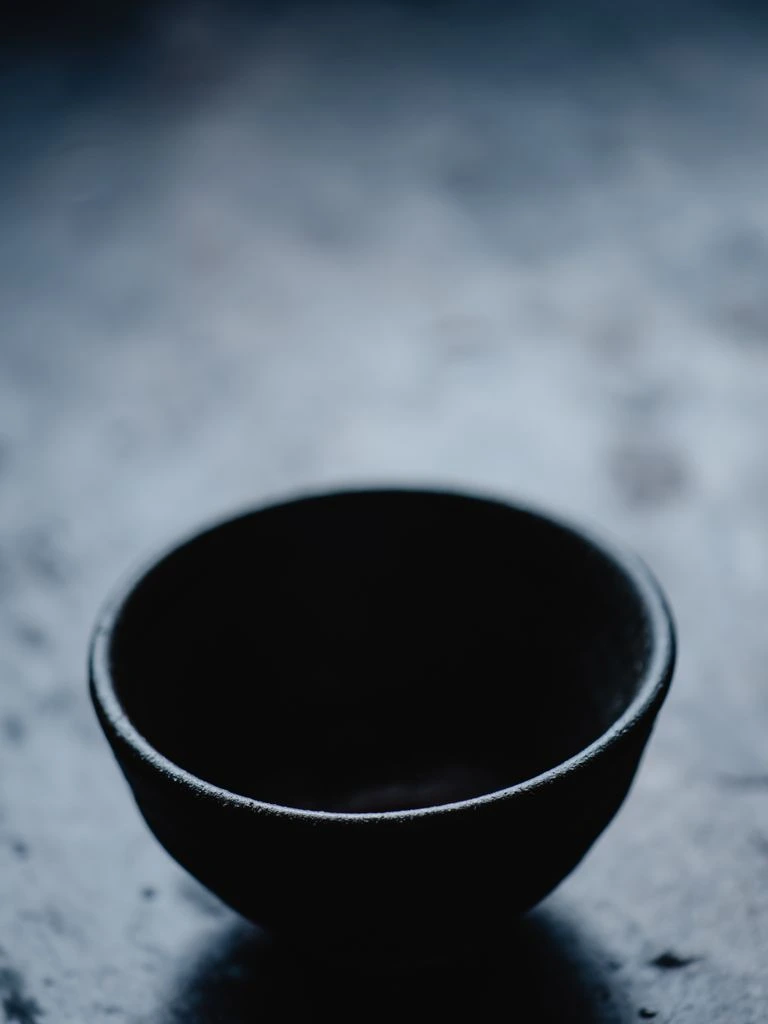 Cremeux and praline arranged on marble